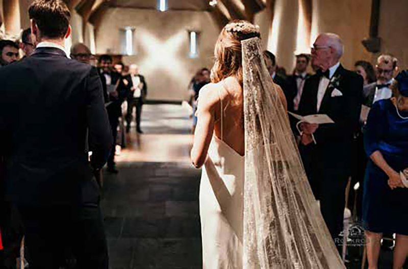 Couple reading their wedding vows at the Great Barn Wedding Venue in Devon