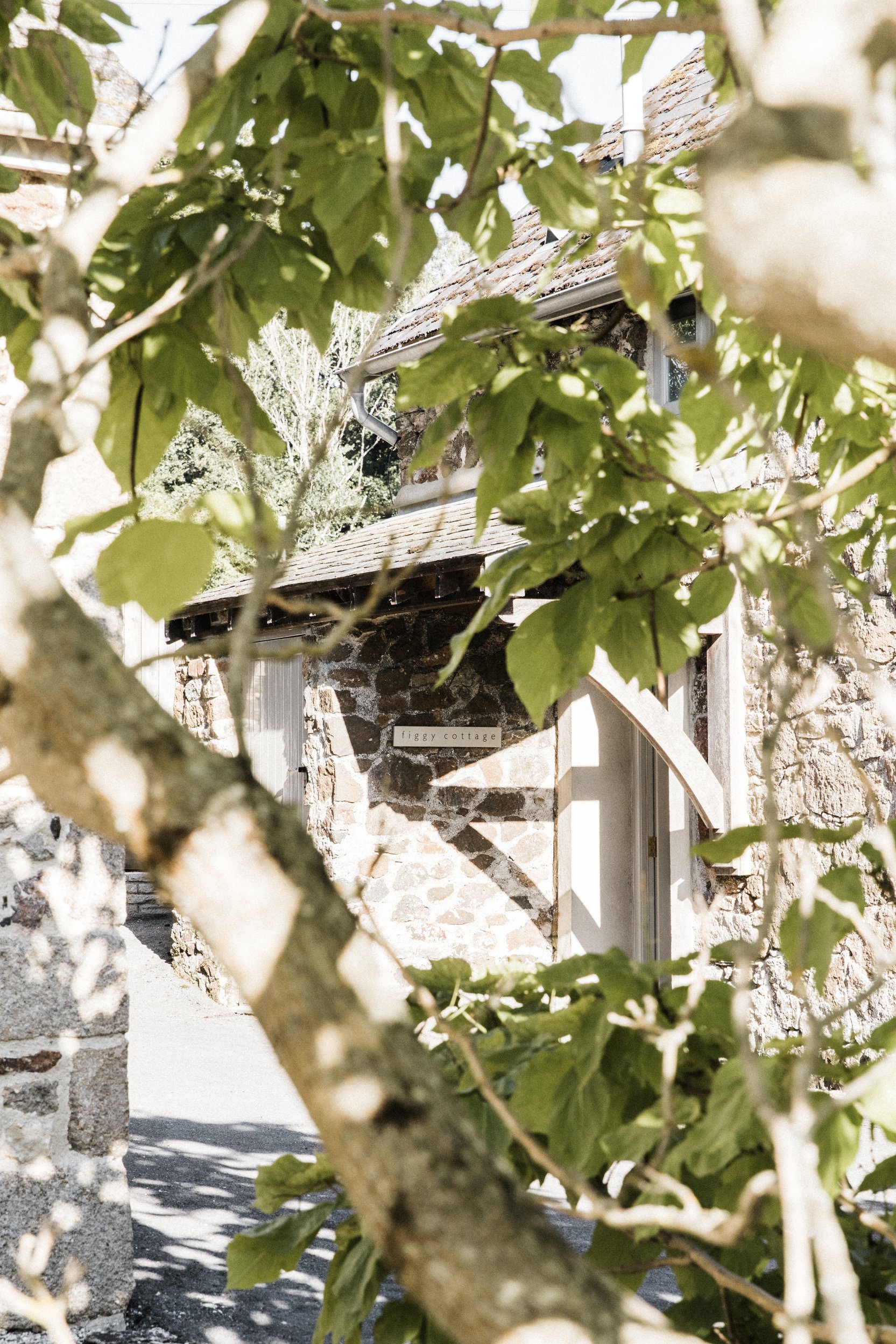 The exterior of accommodation at The Great Barn Devon, a 15th century barn wedding venue | Luxury wedding venue England Devon Wedding Venue |