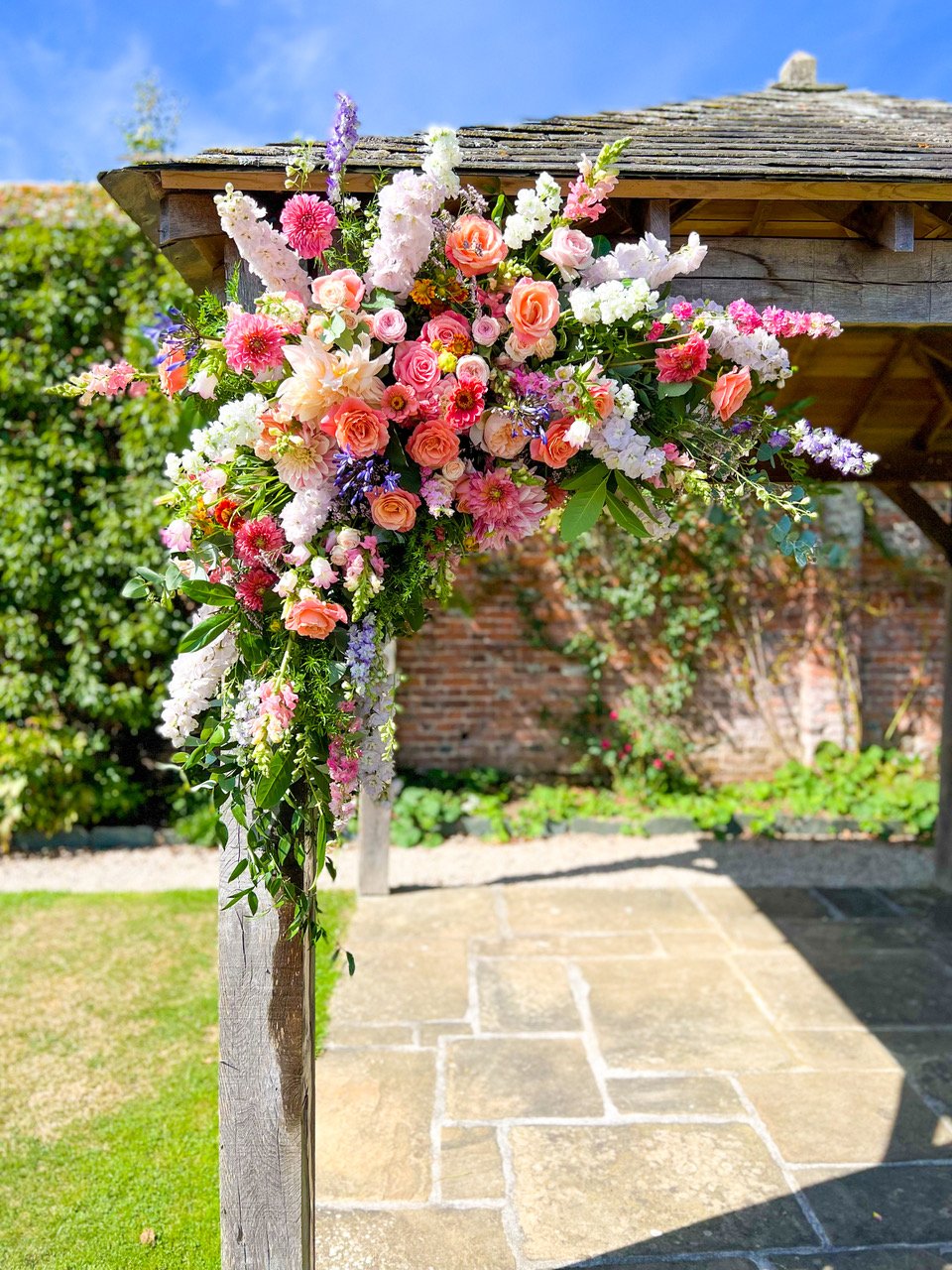wedding flowers by Emma Hewlett Floral design, at a wedding venue | The Great Barn Devon supplier spotlight