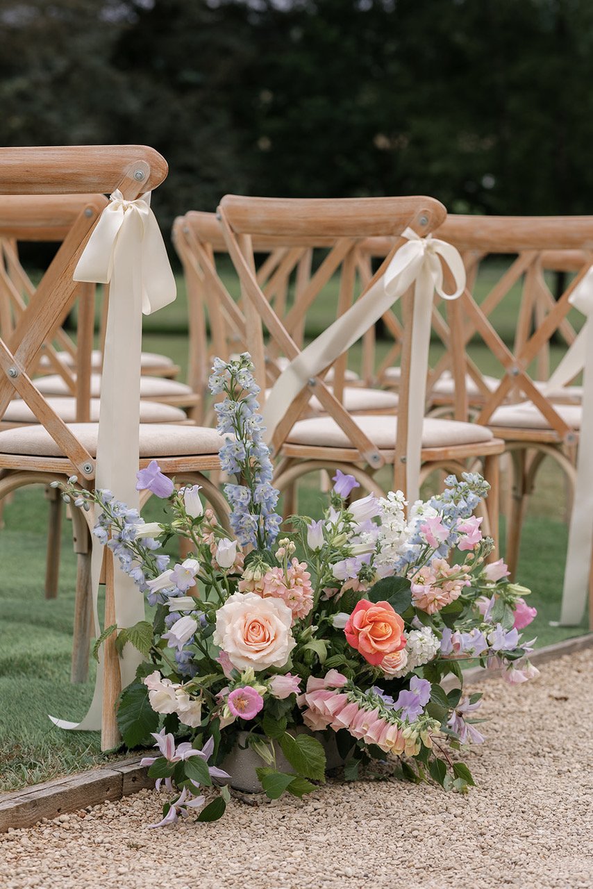 wedding flowers by Emma Hewlett Floral design, at outdoor wedding ceremony | The Great Barn Devon supplier spotlight