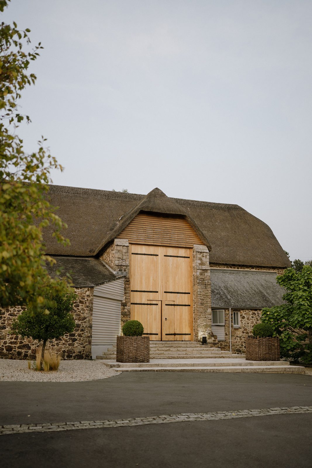 Exterior shot of the great barn devon luxury wedding venue