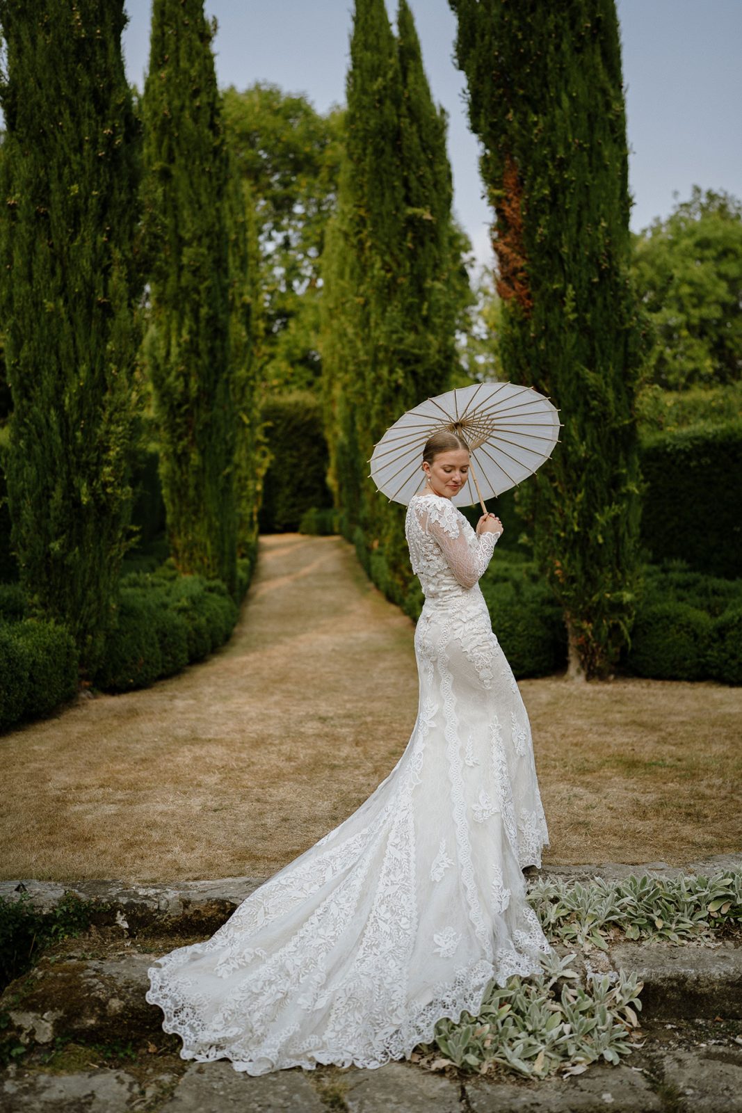 Hannah and Oli celebrating their wedding at The Great Barn Devon, featured in Wed Magazine
