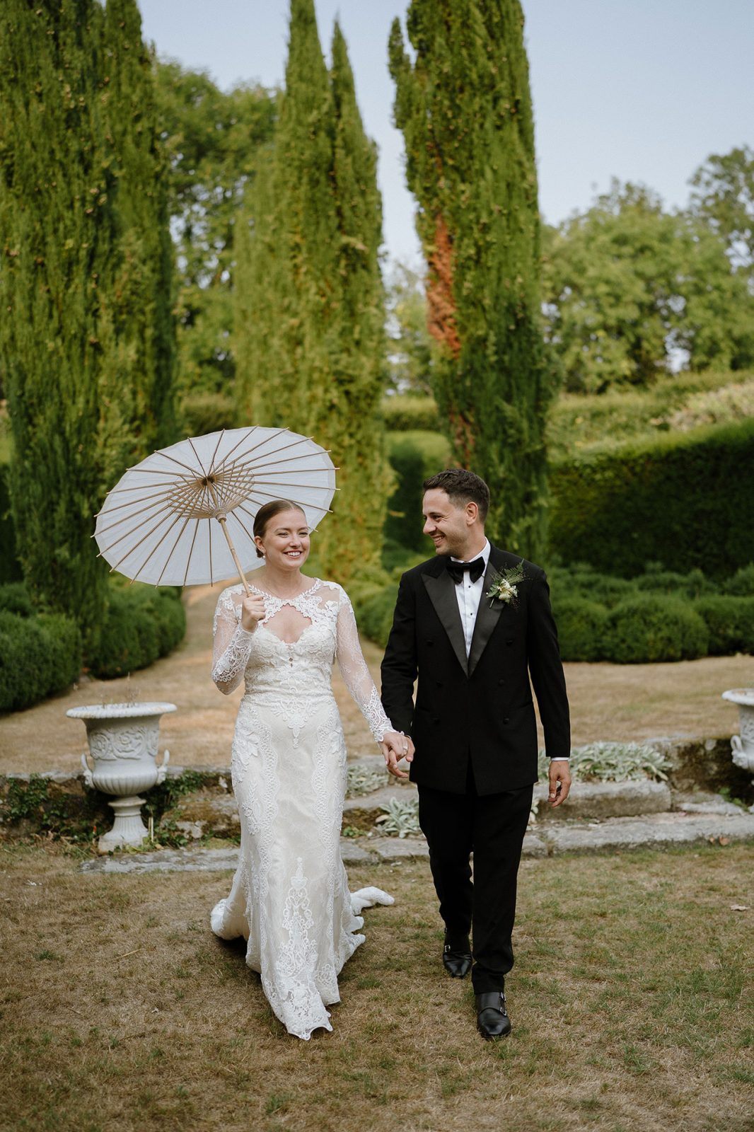 Hannah and Oli celebrating their wedding at The Great Barn Devon, featured in Wed Magazine
