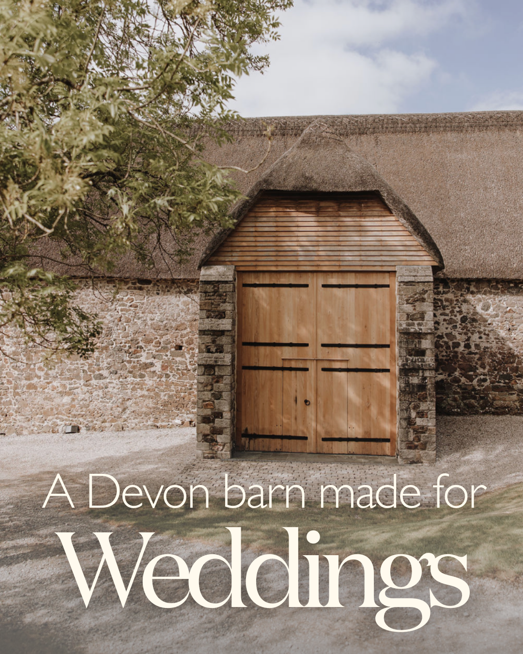 Exterior view of The Great Barn Devon, a 15th-century thatched barn surrounded by Devon countryside, a picturesque wedding venue.