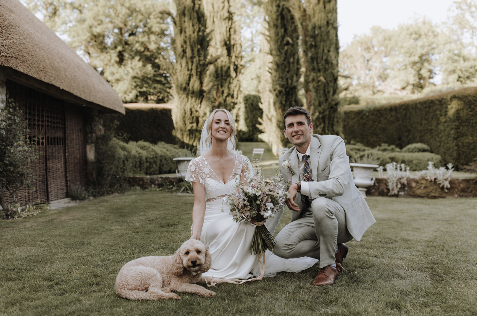 Screenshot 2026-07-02 at 15.03.17 bride groom and dog at wedding great barn devon